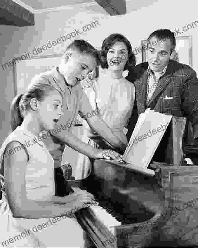 A Group Of Children Gathered Around A Piano, Their Faces Beaming With Joy As They Play The Iconic Tune Of Mary Had A Little Lamb, Their Small Hands Dancing Across The Keys. First 50 Fun Children S Songs You Should Play On Piano