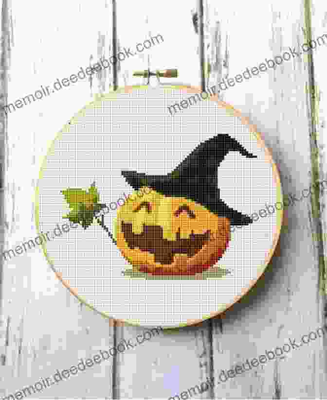 A Photo Of A Finished Halloween Cross Stitch Pattern Of A Pumpkin A Merry Halloween Cross Stitch Pattern: Regular And Large Print Cross Stitch Pattern