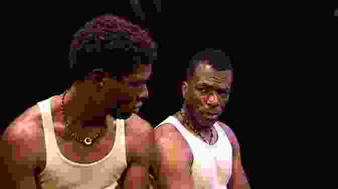 A Scene From 'The Brothers Size,' Depicting Two Brothers Standing On A Bridge. The Brother/Sister Plays Tarell Alvin McCraney