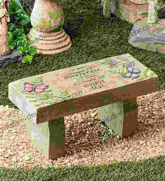 A Small Garden With A Memorial Stone Dedicated To Ruby Doo, Surrounded By Flowers And A Sitting Bench Remembering Ruby Doo My Little Dog: My Treasure In Life Ruby Doo Rest In Peace